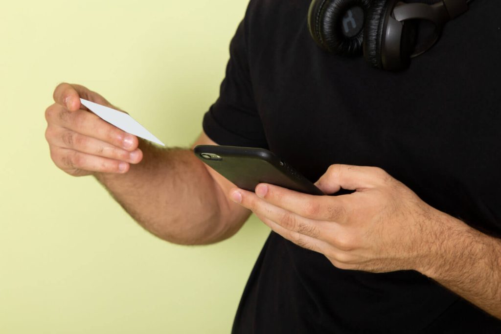 phone-and-card-in-hands